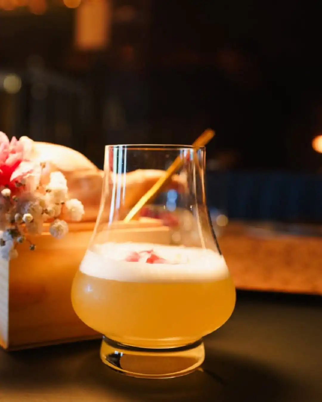A coastal pour that’s all soul—dark rum, jaggery, cumin and pineapple, softened with coconut water.It’s a slow sail through Kerala’s soul, poured into a glass